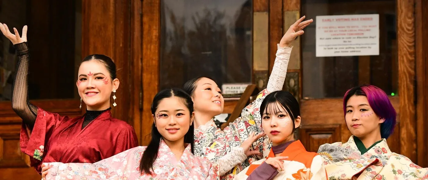 The Edamovement Lab performers in kimono on the steps of a New York building